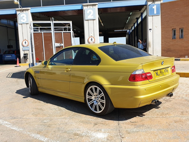 BMW M3 waits to be tested at ITV station BMW M3 in queue
